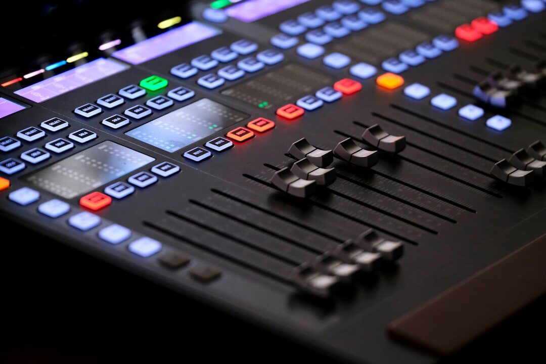 Professional studio headphones on mixing console