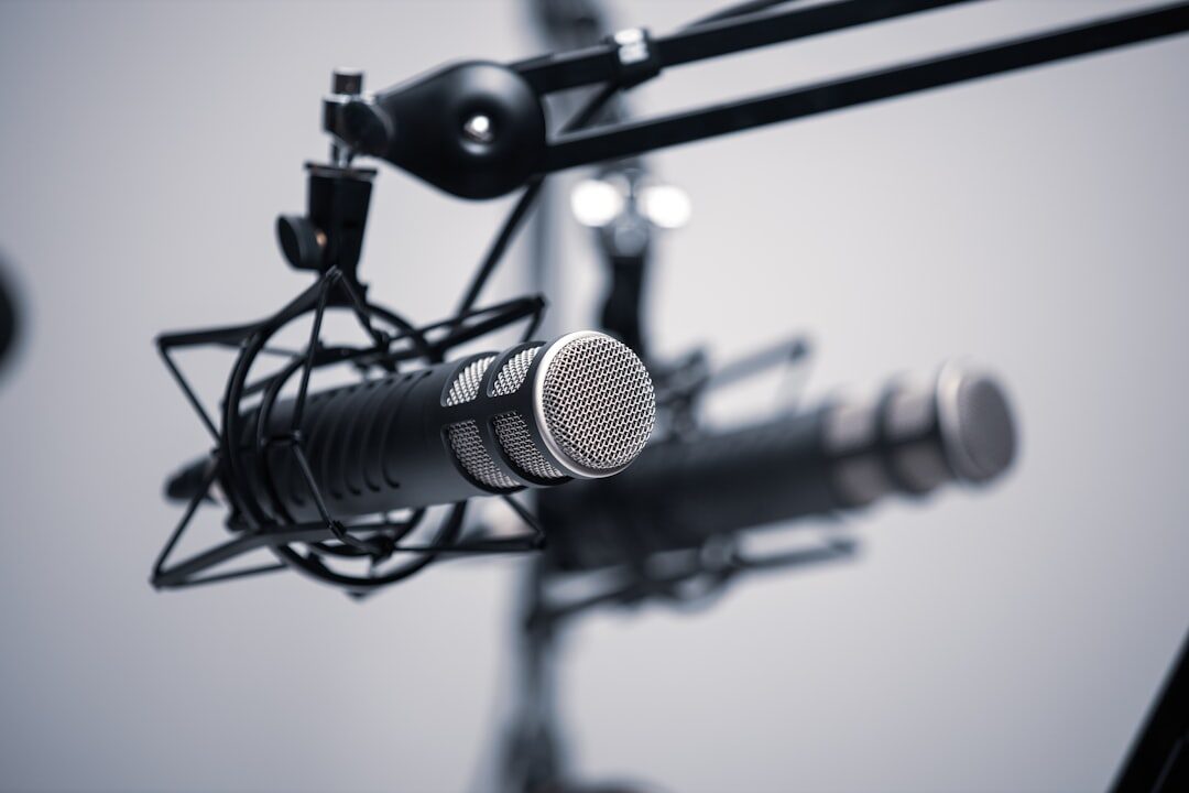 Professional podcast studio interior with microphones and acoustic panels